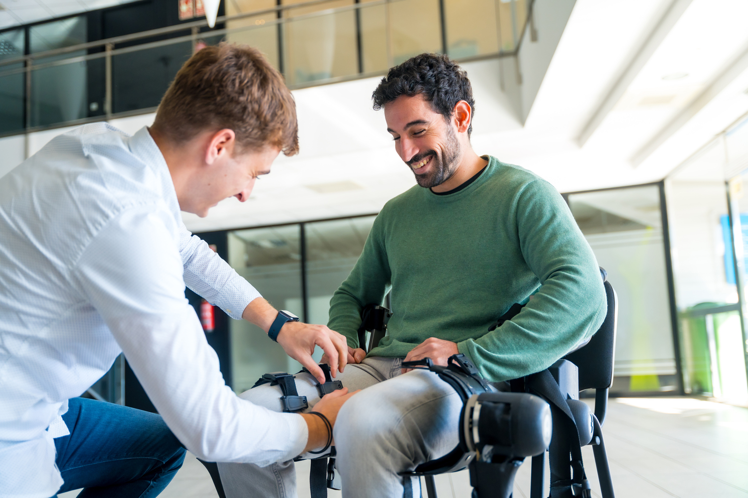 Mechanical Exoskeleton Physiotherapist Placing Tapes Legs Disabled Person Place His Robotic Skeleton Physiotherapy Modern Hospital