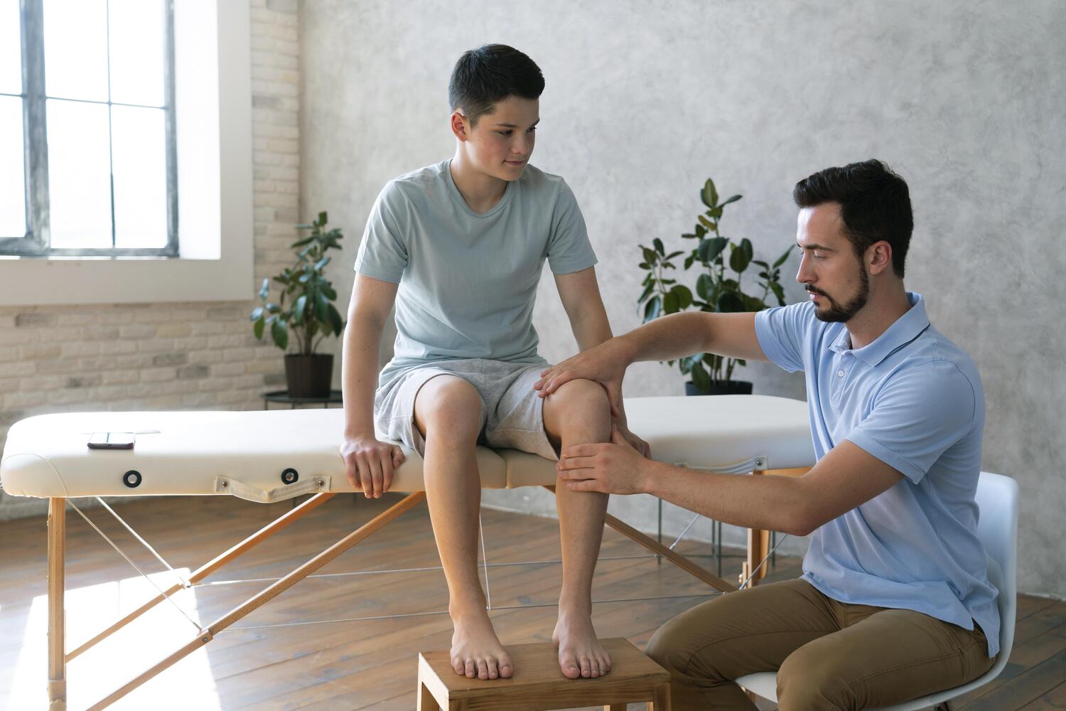 medium shot doctor checking leg at core concept