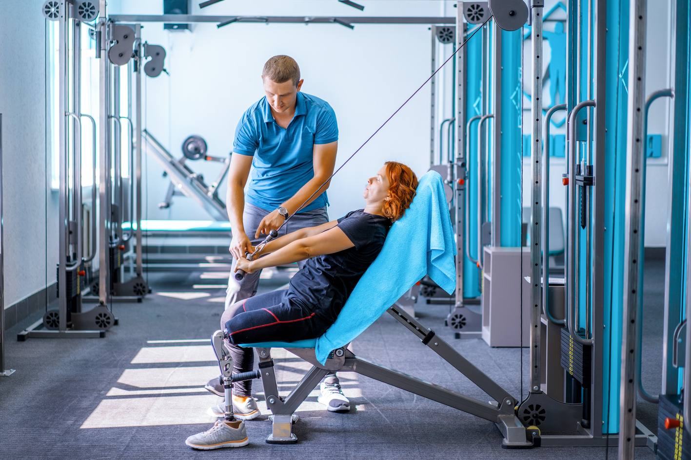 Medical Assistant Helping Patient With Physiotherapy Exercises at Core Concept