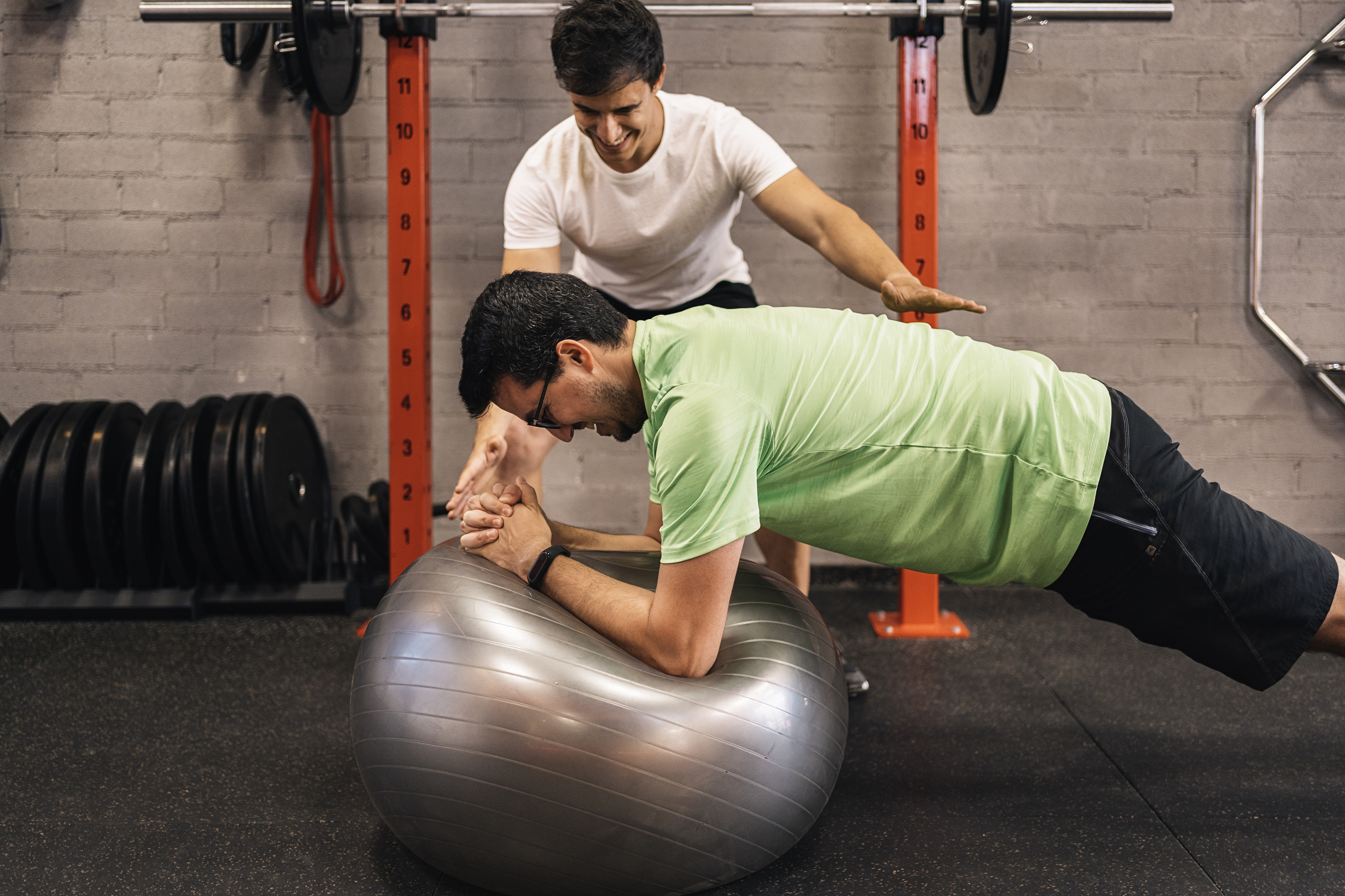 personal trainer correcting habits exercise at core concept