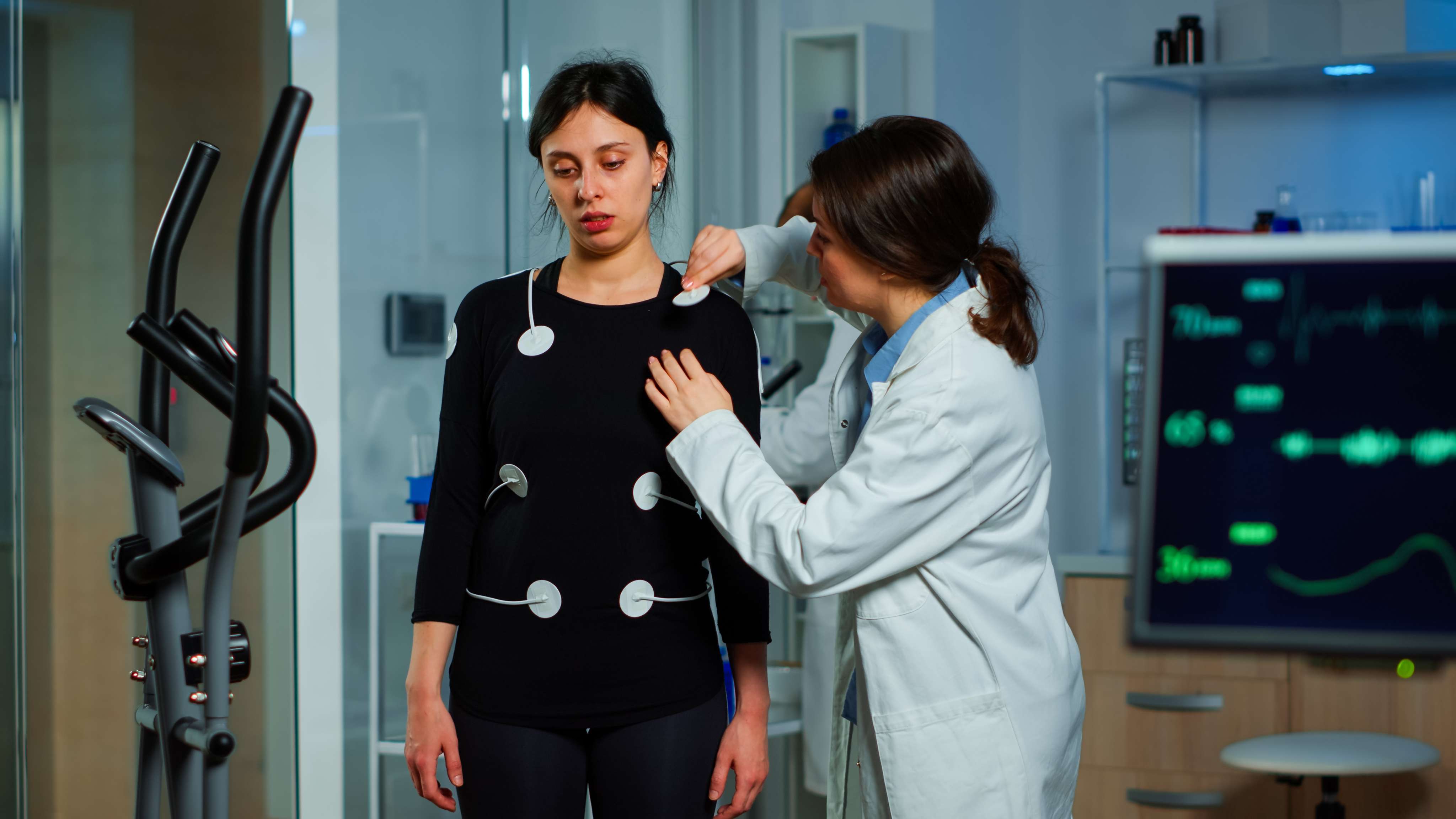 scientist researcher preparing woman patient endurance test attaching at core concept